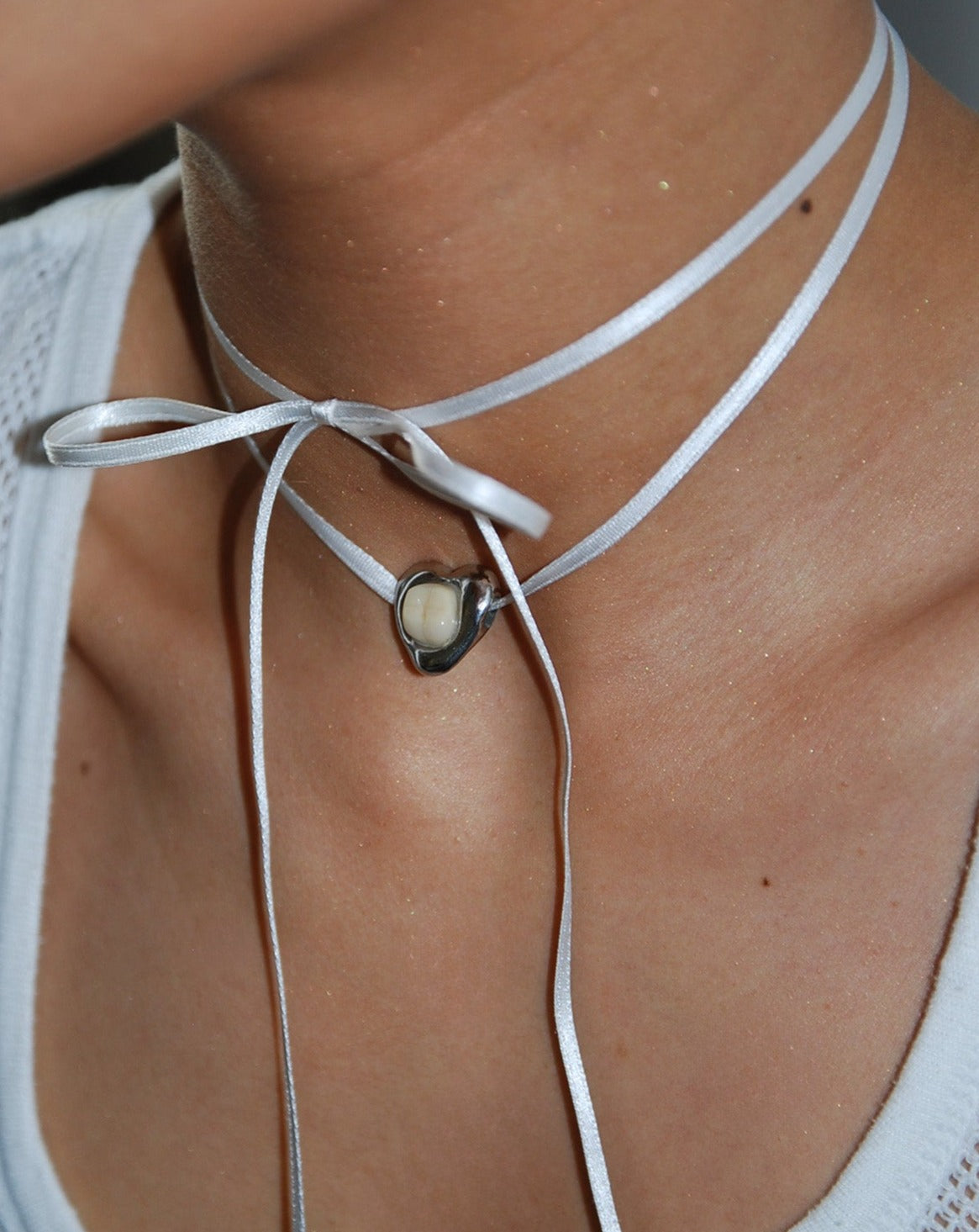 Pendentif coeur - molaire sertie